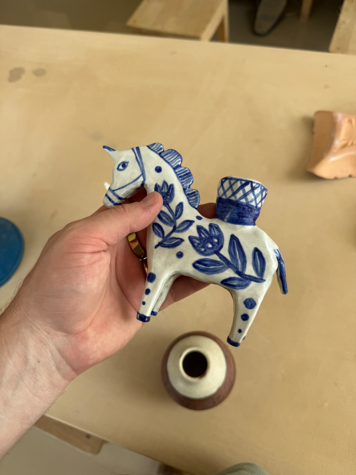 Hand-painted blue ceramic horse